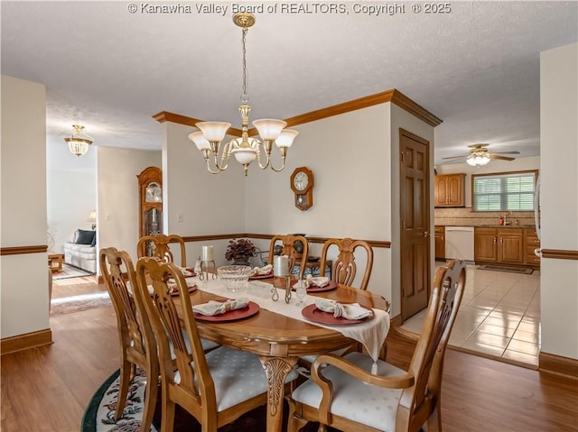 53 Wildrose Ln, Scott Depot, WV 25560 - dining space featuring a chandelier, light wood-type flooring, and ceiling fan