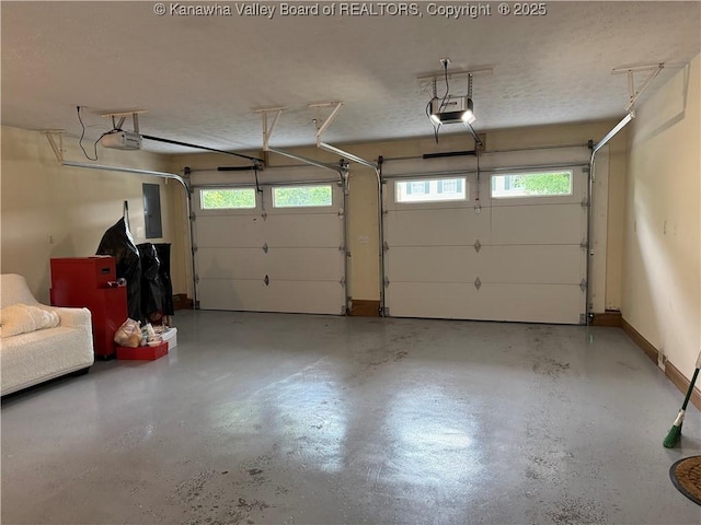 53 Wildrose Ln, Scott Depot, WV 25560 - garage featuring a garage door opener and electric panel