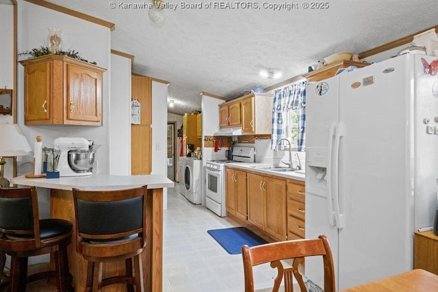2873 Oak Hill Ridge Rd, Bomont, WV 25030 - kitchen featuring white appliances, washer / dryer, light countertops, light floors, and a textured ceiling