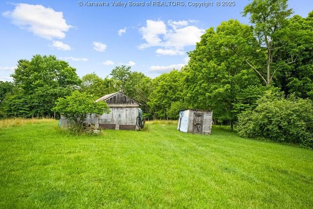 2873 Oak Hill Ridge Rd, Bomont, WV 25030 - view of green lawn with a storage shed and a barn