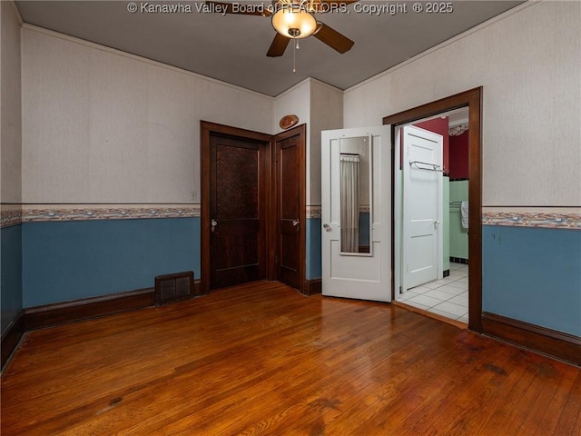 412 C St, Saint Albans, WV 25177 - empty room with ceiling fan and wood finished floors