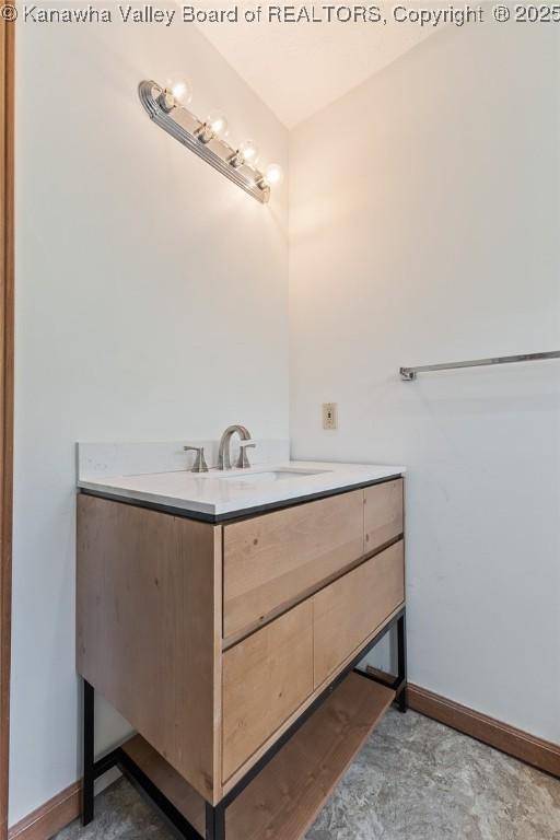 1571 Thistlewood Cir, Hurricane, WV 25526 - bathroom with vanity and baseboards