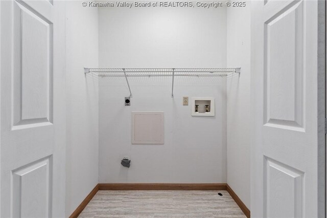 1571 Thistlewood Cir, Hurricane, WV 25526 - washroom featuring electric dryer hookup, washer hookup, and light wood-type flooring