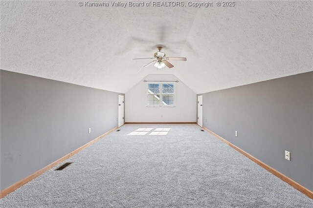 1571 Thistlewood Cir, Hurricane, WV 25526 - bonus room with a textured ceiling, ceiling fan, lofted ceiling, and carpet flooring