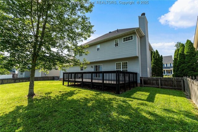 1571 Thistlewood Cir, Hurricane, WV 25526 - back of house with a chimney, a fenced backyard, and a wooden deck