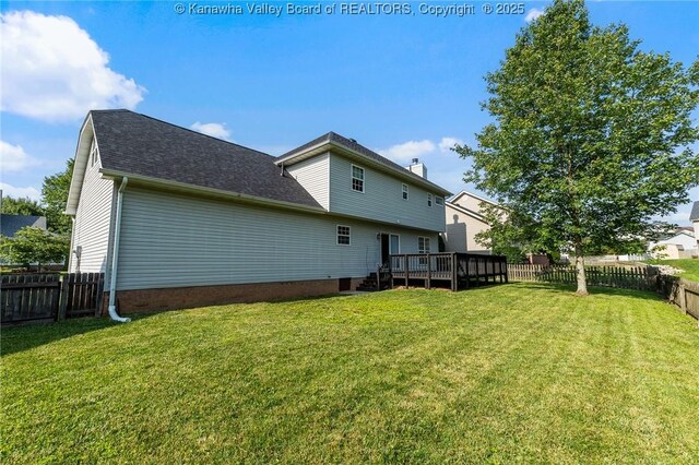 1571 Thistlewood Cir, Hurricane, WV 25526 - rear view of house featuring a fenced backyard, a deck, and a shingled roof