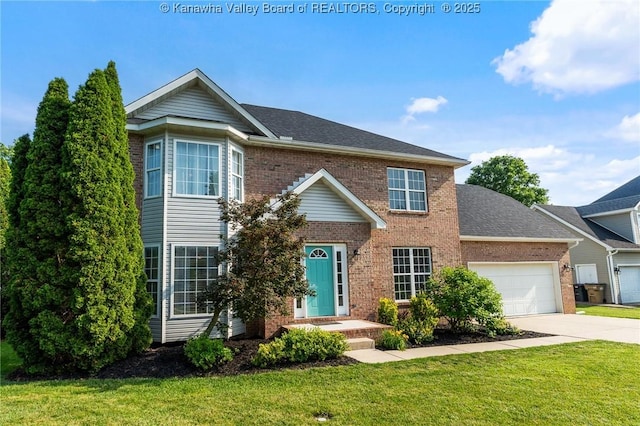 1571 Thistlewood Cir, Hurricane, WV 25526 - view of front of home featuring brick siding, a front yard, an attached garage, and concrete driveway