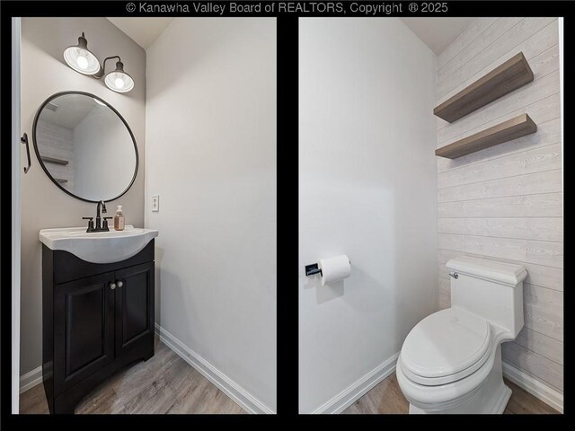 1571 Thistlewood Cir, Hurricane, WV 25526 - bathroom with wood finished floors, vanity, and wood walls