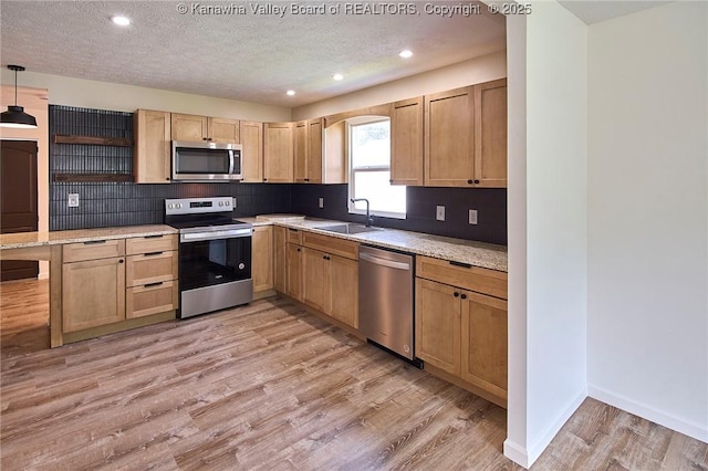 911 Dupont Ave, Nitro, WV 25143 - kitchen featuring stainless steel appliances, open shelves, recessed lighting, backsplash, and light wood-type flooring