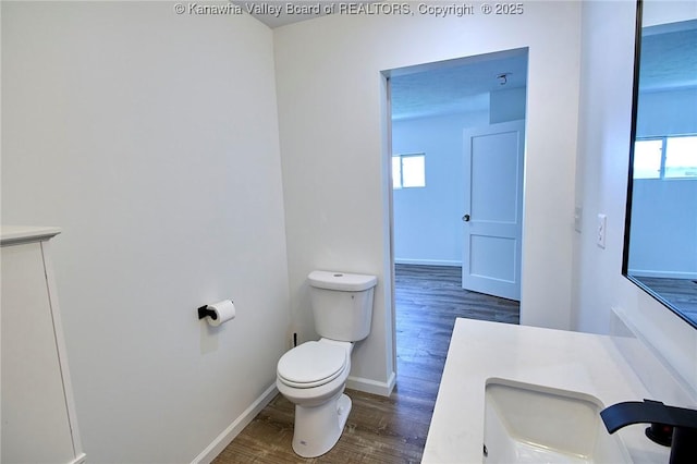911 Dupont Ave, Nitro, WV 25143 - half bath with wood finished floors and vanity