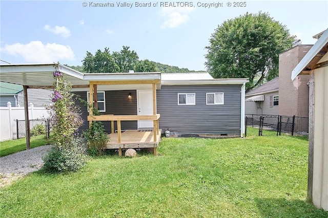 911 Dupont Ave, Nitro, WV 25143 - back of property featuring crawl space and a deck