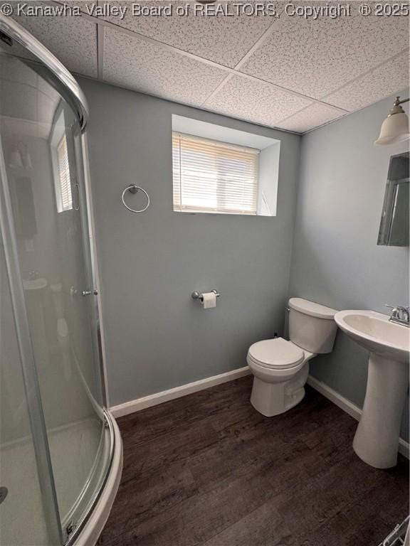 3007 Sansom Ct, Milton, WV 25541 - full bathroom featuring a drop ceiling, a shower stall, and wood finished floors
