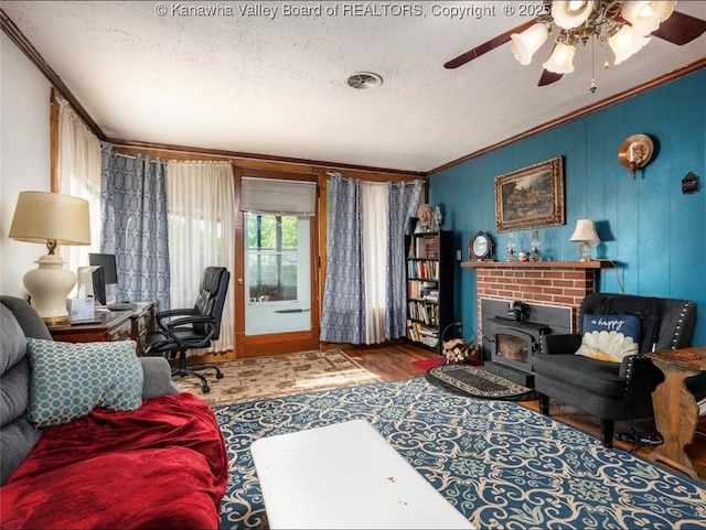 15 Eagle Flight Rd, Ripley, WV 25271 - living area with crown molding, a textured ceiling, wood finished floors, a ceiling fan, and a desk
