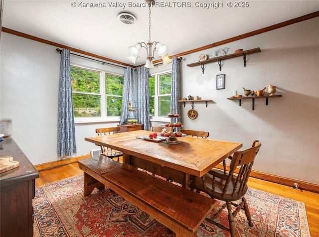 15 Eagle Flight Rd, Ripley, WV 25271 - dining space featuring a chandelier, crown molding, and wood finished floors