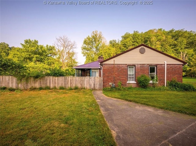 15 Eagle Flight Rd, Ripley, WV 25271 - view of front of home with brick siding and a chimney