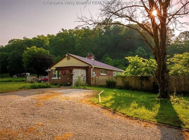 15 Eagle Flight Rd, Ripley, WV 25271 - view of front of home with brick siding, a chimney, and driveway