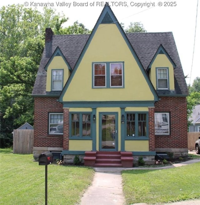 1840-A Oakridge Dr, Charleston, WV 25311 - tudor-style house with entry steps, a shingled roof, stucco siding, and brick siding