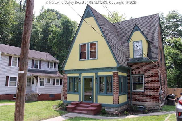1840-A Oakridge Dr, Charleston, WV 25311 - view of front of home with brick siding, entry steps, roof with shingles, and stucco siding