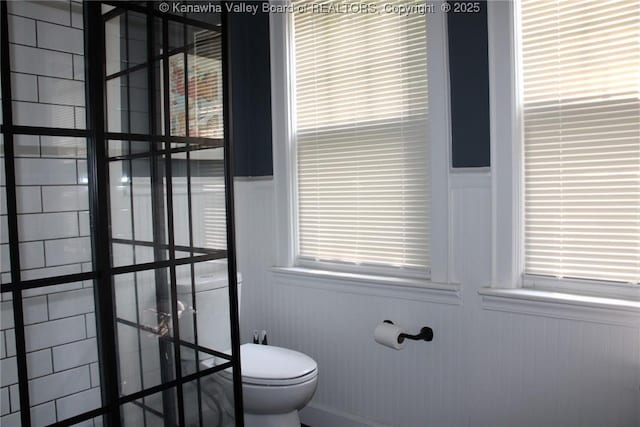1840-A Oakridge Dr, Charleston, WV 25311 - bathroom featuring wainscoting and a decorative wall
