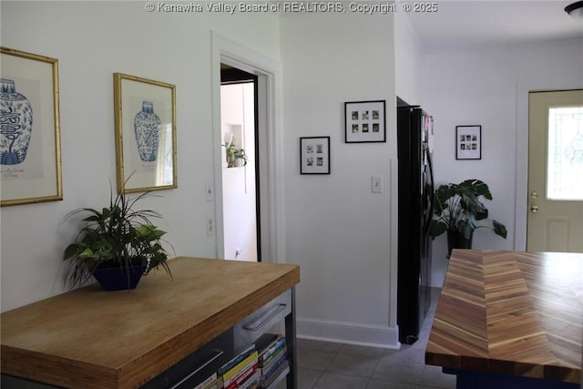 1840-A Oakridge Dr, Charleston, WV 25311 - entrance foyer with dark tile patterned flooring and baseboards