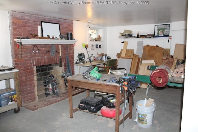 1840-A Oakridge Dr, Charleston, WV 25311 - living room with unfinished concrete floors and a fireplace
