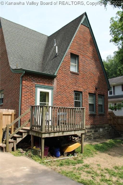 1840-A Oakridge Dr, Charleston, WV 25311 - back of house with roof with shingles, brick siding, and a wooden deck