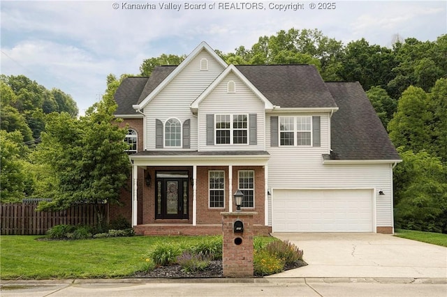 121 Jericho Rd, Winfield, WV 25213 - traditional-style house featuring concrete driveway, a garage, covered porch, brick siding, and a shingled roof