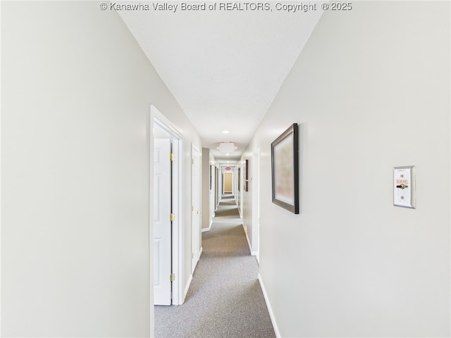 319 Main St, Clay, WV 25043 - hallway featuring baseboards and carpet flooring