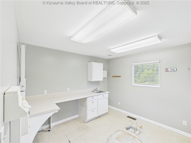 319 Main St, Clay, WV 25043 - unfurnished office featuring baseboards and a sink