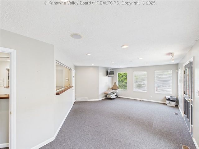 319 Main St, Clay, WV 25043 - empty room featuring carpet, recessed lighting, and a textured ceiling