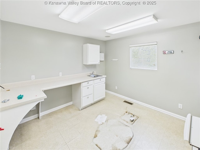 319 Main St, Clay, WV 25043 - unfurnished office with a sink and baseboards
