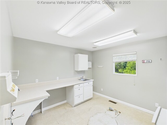 319 Main St, Clay, WV 25043 - unfurnished office featuring baseboards and a sink