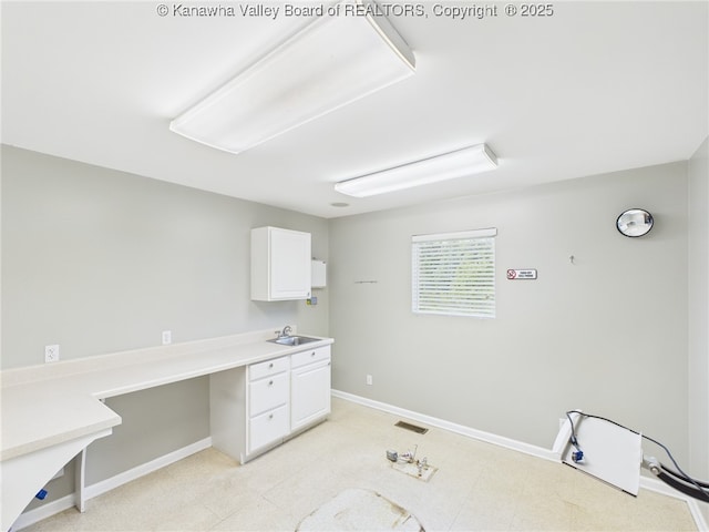 319 Main St, Clay, WV 25043 - laundry area featuring baseboards and an office area