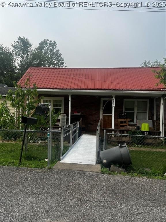 4208 Crede Dr, Charleston, WV 25302 - view of front of house with covered porch and a metal roof