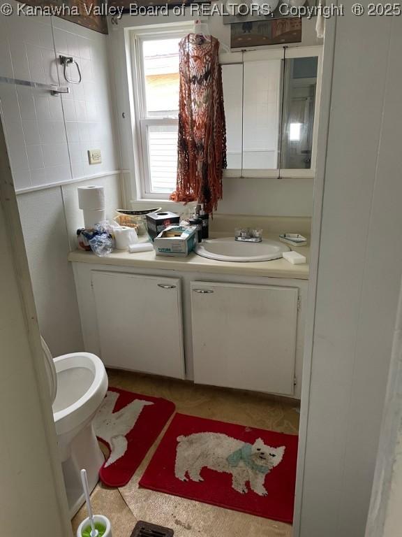 4208 Crede Dr, Charleston, WV 25302 - half bathroom with vanity and toilet