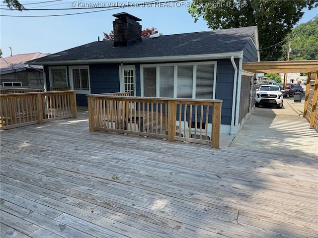 1524 Fenton Cir, Nitro, WV 25143 - wooden deck featuring a carport