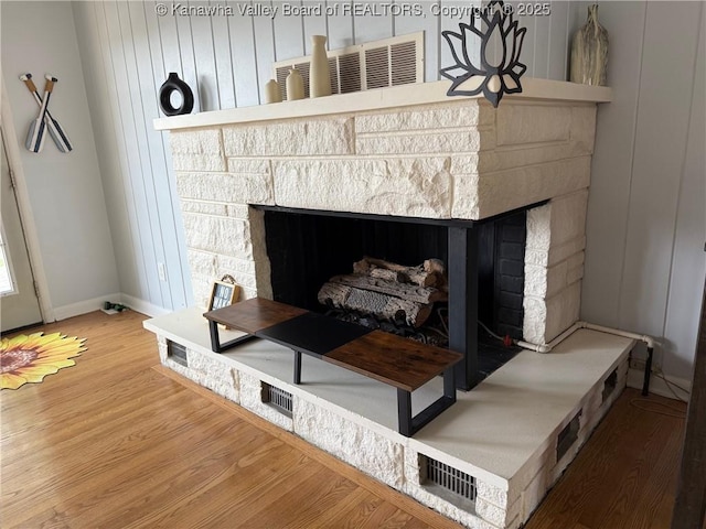 1524 Fenton Cir, Nitro, WV 25143 - detailed view of a stone fireplace and wood finished floors