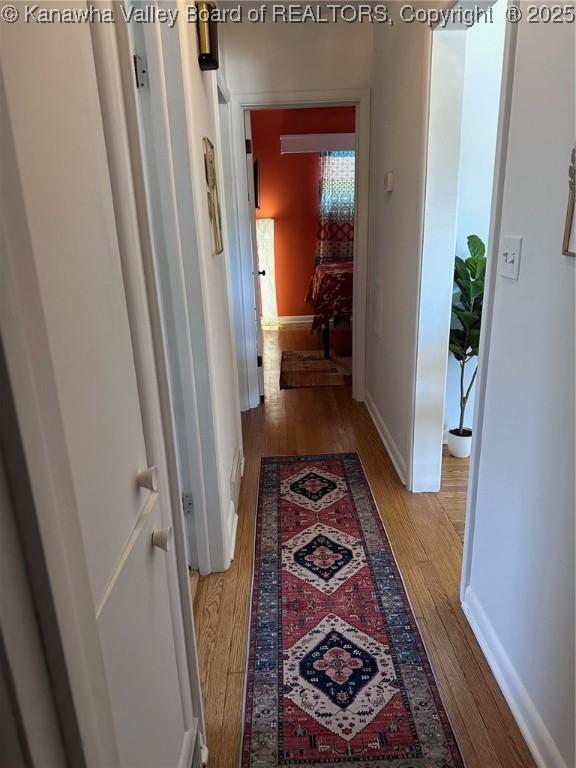 1524 Fenton Cir, Nitro, WV 25143 - corridor featuring wood finished floors and baseboards
