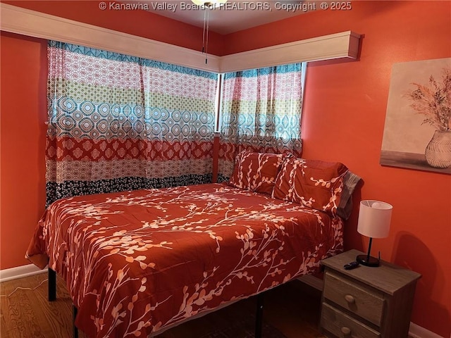 1524 Fenton Cir, Nitro, WV 25143 - bedroom featuring wood finished floors and baseboards