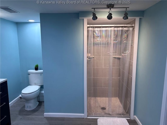 1524 Fenton Cir, Nitro, WV 25143 - full bathroom with wood finished floors, a tile shower, and vanity