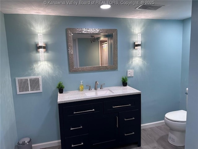 1524 Fenton Cir, Nitro, WV 25143 - full bath with vanity and wood finished floors