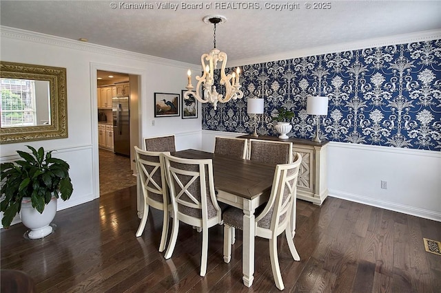 1004 Wethersfield Xing, Hurricane, WV 25526 - dining room featuring wainscoting, a chandelier, dark wood finished floors, and crown molding