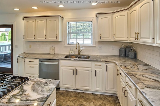1004 Wethersfield Xing, Hurricane, WV 25526 - kitchen with stainless steel appliances, backsplash, light stone counters, and recessed lighting