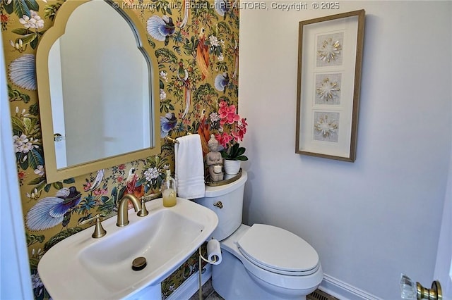 1004 Wethersfield Xing, Hurricane, WV 25526 - bathroom featuring a sink and wallpapered walls