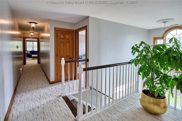 1004 Wethersfield Xing, Hurricane, WV 25526 - hallway featuring an upstairs landing and healthy amount of natural light