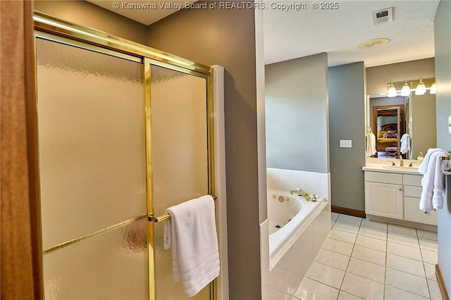 1004 Wethersfield Xing, Hurricane, WV 25526 - bathroom with vanity, a stall shower, a bath, and tile patterned flooring