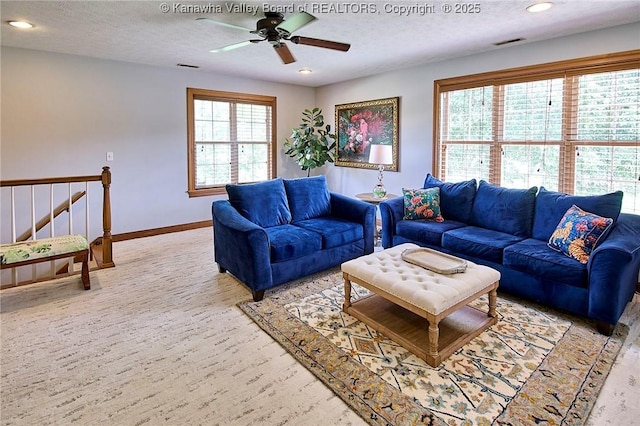 1004 Wethersfield Xing, Hurricane, WV 25526 - living room with a ceiling fan, a textured ceiling, and recessed lighting