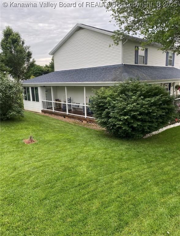 9 White Oak Dr, Culloden, WV 25510 - rear view of property featuring a yard and a shingled roof