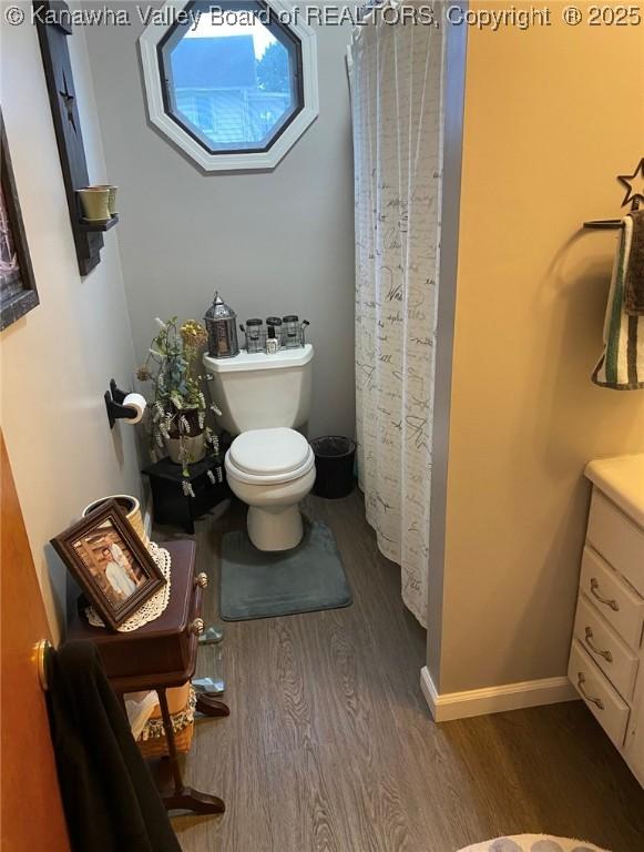9 White Oak Dr, Culloden, WV 25510 - bathroom with wood finished floors and vanity