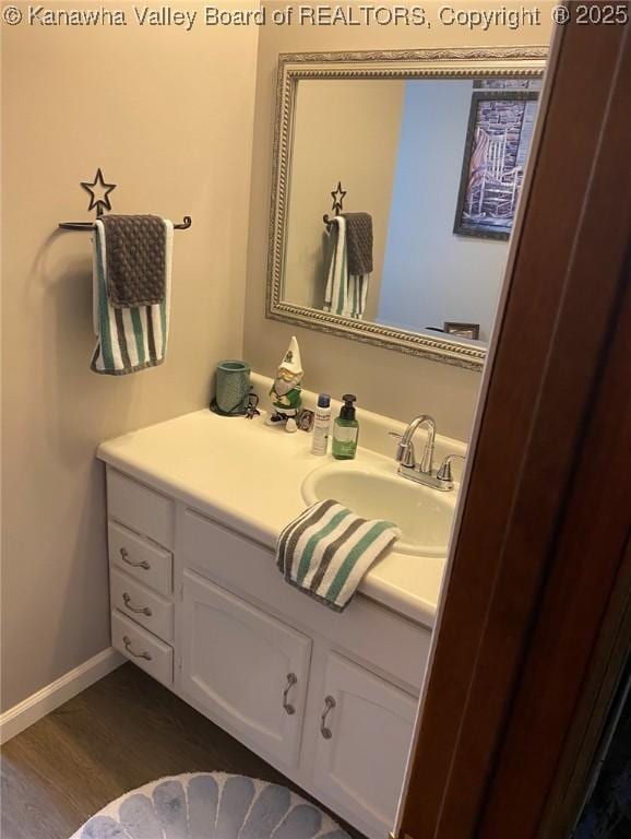 9 White Oak Dr, Culloden, WV 25510 - bathroom with vanity and wood finished floors